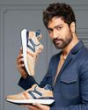 ON THE FRONT FOOT India's Footwear & Accessories Industry Races Ahead14