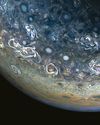 Jupiter's surreal clouds swirl in a new view from NASA's Juno probe