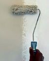 Paint roller tip for clean corners