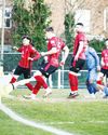 LOUIE NETS TREBLE TO STUN THE SEASIDERS