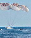 Perfect splashdown: Smiles, thumbs-up63