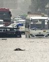 City goes under again: Yearly rainy day scenes play out despite preps13