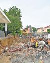 7 dead as Capital crumbles under rain again12