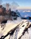 Mount Etna emits ash, smoke70