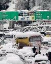 Hundreds stranded, roads shut as heavy snowfall cuts off Hills30