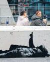 Street artist Banksy unveils latest work in UK23