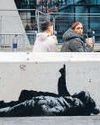 Street artist Banksy unveils latest work in UK52