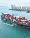 Cargo ships running on oil are cruising slowly into the sunset53