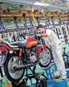 Two-wheeler cos in final push to defer new safety norms Two-wheeler cos in final push to defer new safety norms24