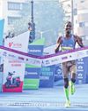 Tesfay, Chepkemoi bag full marathon titles