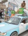 Afghan taxi drivers install handmade air coolers20