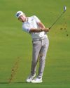 McIlroy shares lead, takes major step towards Race to Dubai title75