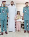 Ajman Police honour girl for honesty12