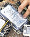 Silver tops $75 as gold surges to records52