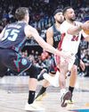 Powell scores 36 points, leads Heat past Pistons, Rockets down Nets63