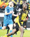 Guirassy scores double to help Dortmund move six points behind leaders Bayern Guirassy scores double to help Dortmund move six points behind leaders Bayern61