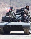 N.Korean leader, daughter try out new tank23