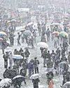 Rain hits north India, mercury plunges; Kashmir reels under intense cold