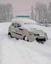 Stranded tourists find shelter in mosque amid heavy snowfall in Kashmir's Gund