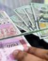 Rupee falls 6 paise to 85.74 against dollar