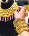 Gold nears Rs 1L-mark Gold nears Rs 1L-mark