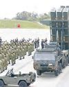 Japan's Cabinet OKs record defense budget that aims to deter China11