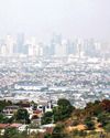 Haze spreads across Metro Manila as Navotas landfill fire continues Haze spreads across Metro Manila as Navotas landfill fire continues0