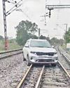 Woman drives car on railway track, detained1