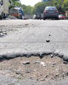 Bad roads, garbage mounds welcome visitors at industrial estate in Guindy11