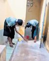 Govt school HM suspended after video of two girl students cleaning toilet goes viral Govt school HM suspended after video of two girl students cleaning toilet goes viral