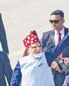 With maroon turban, Modi maintains headgear custom38