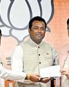 BJP PROMISES TO PROTECT LAND15