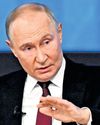 Putin says war boosted military, economy