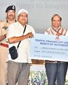L-G Presents Medals, Cash Prizes to Traffic Volunteers L-G Presents Medals, Cash Prizes to Traffic Volunteers