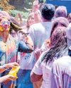 BAREFOOT IN THE SAND DRENCHED IN COLOR HOLI BY THE BEACH AT ITS PUREST30
