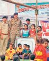 सिविक एक्शन प्रोग्राम में ग्रामीण बच्चों को दिए खेल सामग्री10