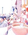CM Majhi serves 'Tanka Torani' to devotees during Rath Yatra in Puri12