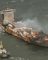 Fires put out on crash ship amid plastics spill clean-up Fires put out on crash ship amid plastics spill clean-up