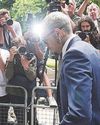 Singer's not guilty plea over bottle attack'
