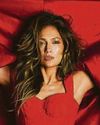 Latin her hair down...J-Lo's always in Vogue6