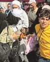 FIRST BRITONS FLEE GAZA HELL0