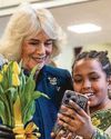 Good sport! Queen's game of table tennis makes girl's day