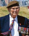 Tributes to D-Day hero who gave up his dinner to help French girl