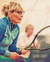 How can I ease the pain in my hands playing tennis?