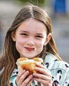 Baker's dozens show up for hot cross bun