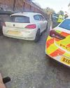 Shock moment banned driver tries to mow down police Shock moment banned driver tries to mow down police