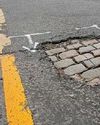 Pothole uncovers Victorian cobbles Pothole uncovers Victorian cobbles