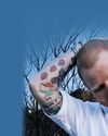 Singer's shaved head 'signifies fresh start'17