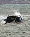 Car washed into sea at beauty spot