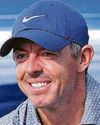 Rory slips but helps pal to the Dubai lead56